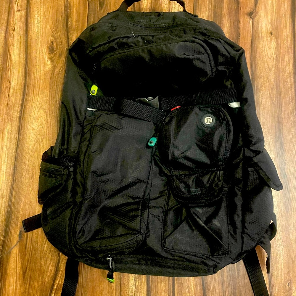 Lululemon black backpack with lots of pockets. Retired style.